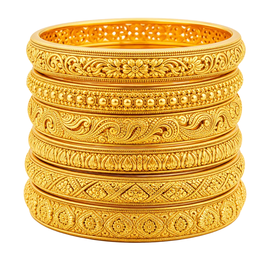 Stack of engraved gold bangles